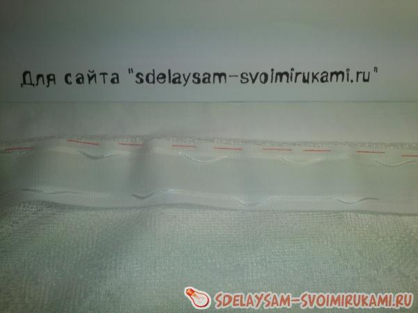 приметать к изнаночной стороне