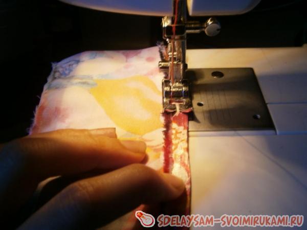 Один край пояса подвернем