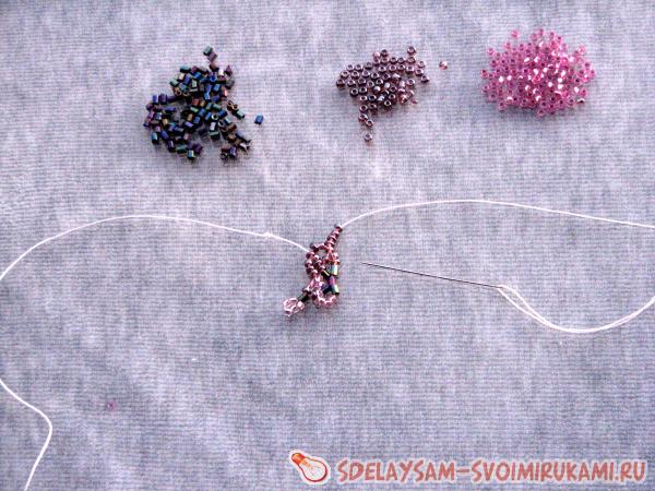 одеть четыре аметистовые бисеринки