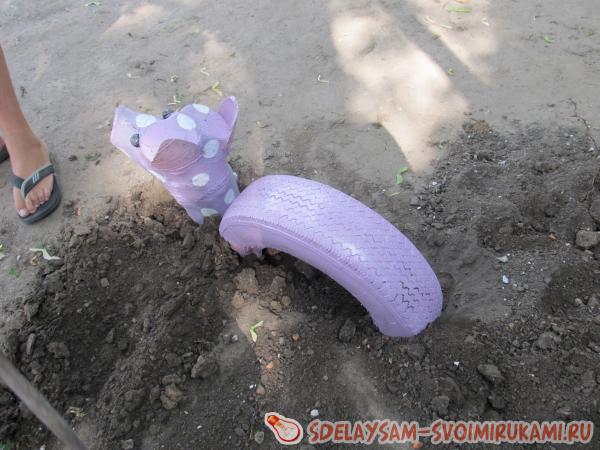 Украшение для садика из колеса