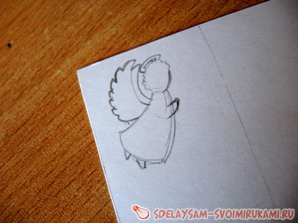 вырезание бумажных ангелов